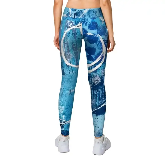 Abstract White Circles on Blue Artsy Print of Original Painting, Leggings modeled on female, Back side.